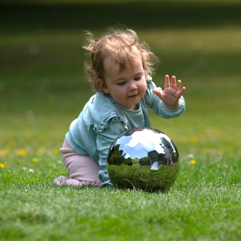 child exploring tickit sensory toys for multiple learning experiences